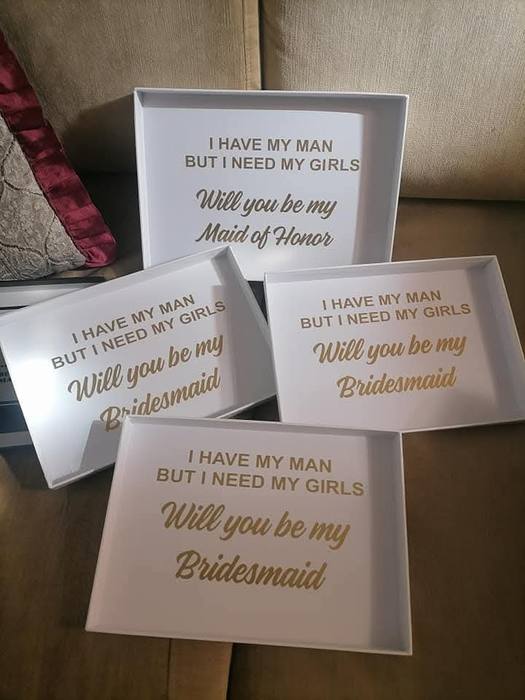 Four white proposal boxes printed in gold, asking will you be my maid of honour and bridesmaid