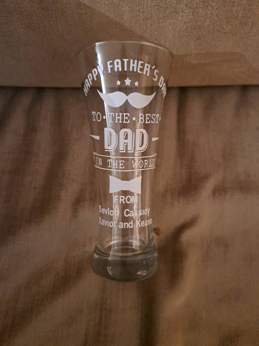Tall beer glass printed Happy Father's Day to the best dad in the world, with the children's names